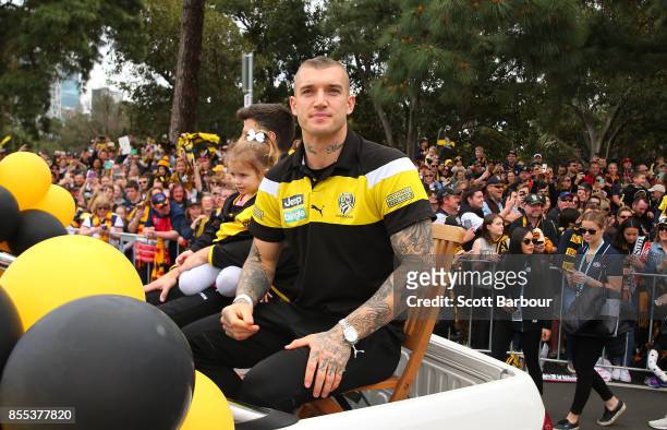 Dustin Martin of the Tigers waves to the crowd during the 2017 AFL Grand Final Parade on September 29, 2017 in Melbourne, Australia.