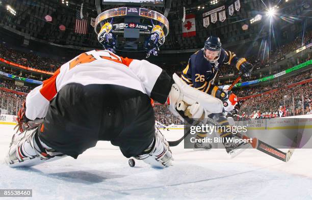 Thomas Vanek of the Buffalo Sabres has his shot stopped by Martin Biron of the Philadelphia Flyers on March 20, 2009 at HSBC Arena in Buffalo, New...