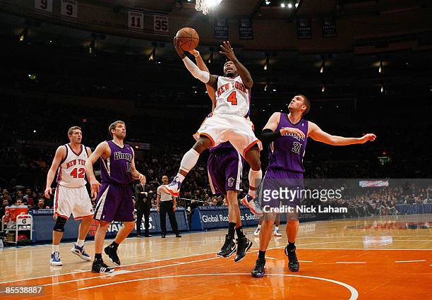 Nate Robinson of the New York Knicks lays the ball up against the Sacramento Kings on March 20, 2009 at Madison Square Garden in New York City. NOTE...