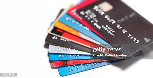 pile of credit cards - credit card debt stockfoto's en -beelden