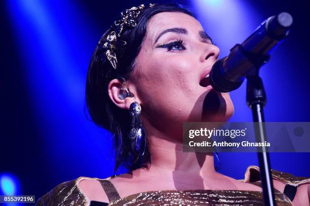 Nelly Furtado performs on stage at the auction for the inaugural "Monte-Carlo Gala for the Global Ccean" honoring Leonardo DiCaprio at the Monaco...