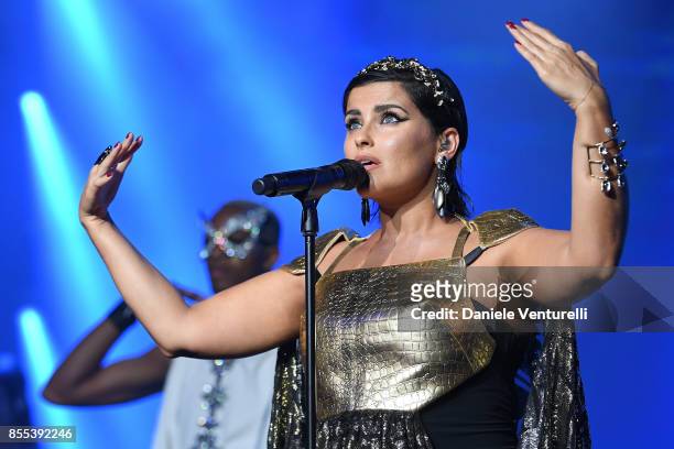 Nelly Furtado performs on stage at the auction for the inaugural "Monte-Carlo Gala for the Global Ccean" honoring Leonardo DiCaprio at the Monaco...