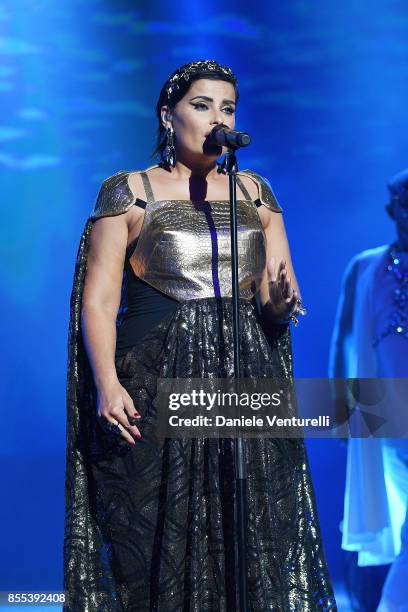 Nelly Furtado performs on stage at the auction for the inaugural "Monte-Carlo Gala for the Global Ccean" honoring Leonardo DiCaprio at the Monaco...