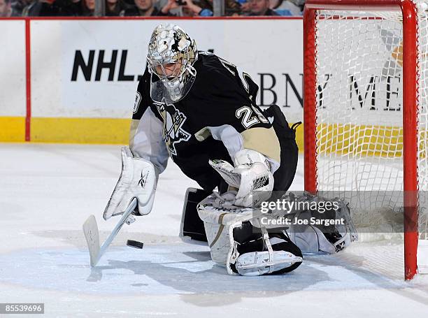 Marc-Andre Fleury of the Pittsburgh Penguins makes a save against the Los Angeles Kings on March 20, 2009 at Mellon Arena in Pittsburgh, Pennsylvania.