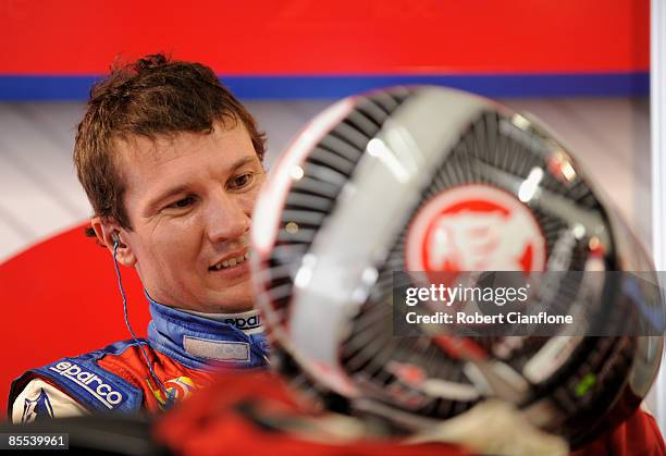 Jason Richards driver of the Brad Jones Racing Holden prepares for the warm up prior to race one of the Clipsal 500, which is round one of the V8...