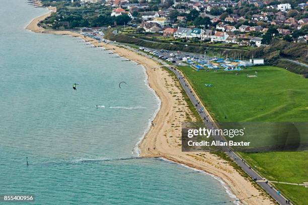 aerial view of the beach on the solent - motor paraglider stock pictures, royalty-free photos & images