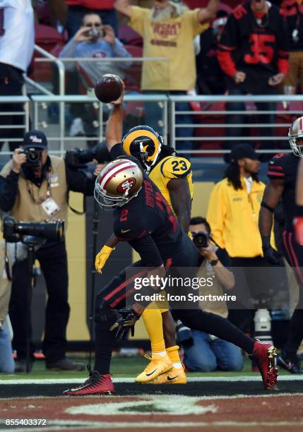 San Francisco 49ers Quarterback Brian Hoyer spikes the ball in the endzone after running for a touchdown during an NFL game between the Los Angeles...