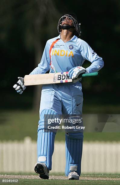 Anjum Chopra of India reacts after being bowled out by Erin Osbourne of Australia during the ICC Women's World Cup 2009 3rd v 4th play off match...