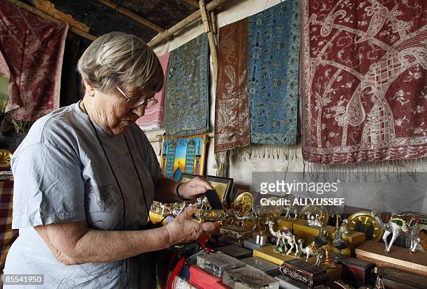 British tourist Bridget Jones shops for souvenirs and local artifacts at a gift shop in Baghdad on March 21, 2009. The first Western firm to bring a...