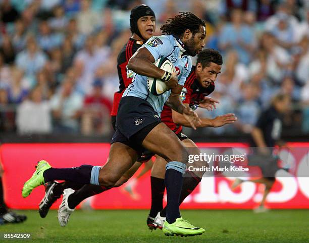 Lote Tuqiri of the Waratahs makes a break during the round six Super 14 match between the Waratahs and the Crusaders at ANZ Stadium on March 21, 2009...