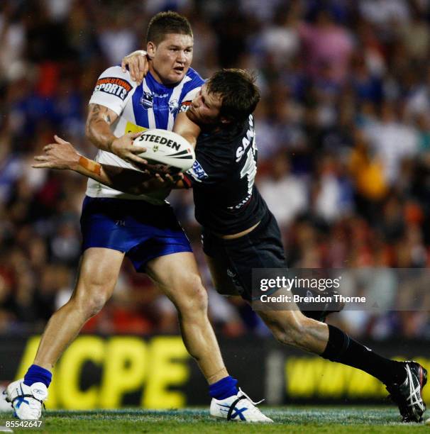 Greg Eastwood of the Bulldogs looks to offload the ball during the round two NRL match between the Penrith Panthers and the Bulldogs at CUA Stadium...