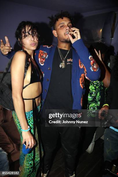 Odalys Peña and Smoke Purpp backstage at Highline Ballroom on September 28, 2017 in New York City.