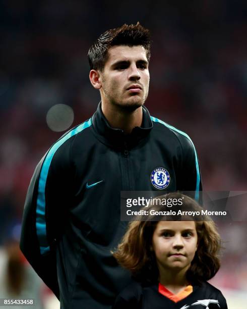 Alvaro Morata of Chelsea FC listens to the UEFA Champions League hymn prior to start the UEFA Champions League group C match between Atletico Madrid...