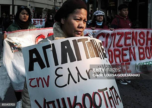 Immigrants to Greece march during an immigrant's demonstration in Athens on March 21 the International Day for the Elimination of Racial...