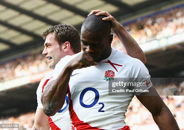 Ugo Monye of England celebrates with Mark Cueto as he scores their first try during the RBS 6 Nations Championship match between England and Scotland...