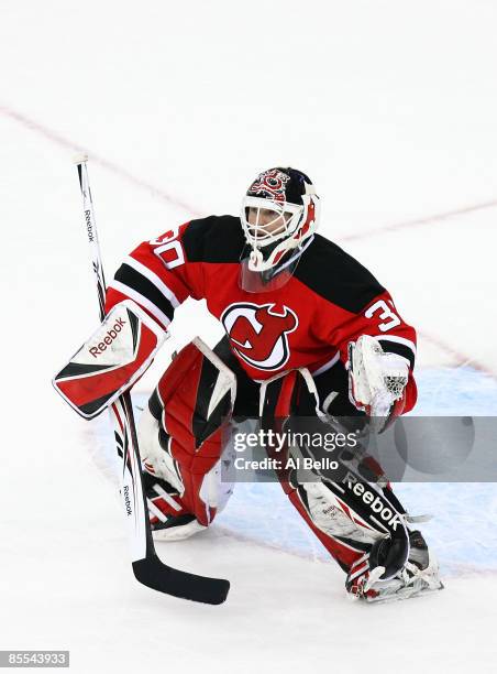 Goaltender Martin Brodeur of the New Jersey Devils defends the net during the game against the Chicago Blackhawks on March 17, 2009 at The Prudential...