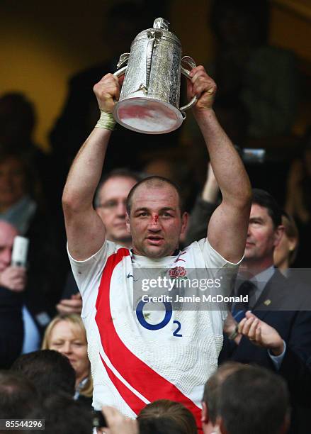 Steve Borthwick of England lifts the Calcutta Cup after winning the RBS 6 Nations Championship match between England and Scotland at Twickenham on...