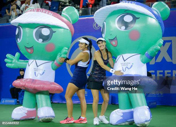 Yung jan Chan of Chinese Taipei and Martina Hingis of Switzerland celebrate following their victory during the Ladies Doubles semi final against...