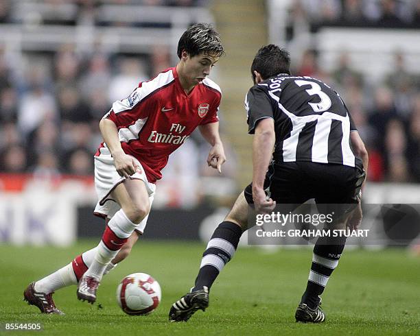 Newcastle United's Spanish defender Sanchez Jose Enrique vies with Arsenal's French player Samir Nasri during an English FA Premier League, football...