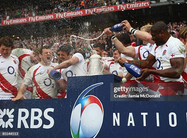 The England team celebrate winning the Calcutta Cup after the RBS 6 Nations Championship match between England and Scotland at Twickenham on March...