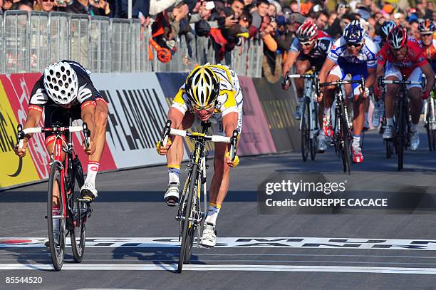 Britain's Mark Cavendish of Team Columbia crosses the finish line to win the 100th Milano Sanremo classic cycling race, ahead of German Heinrich...