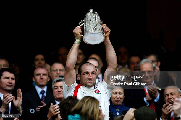 Steve Borthwick of England lifts the Calcutta Cup after winning the RBS 6 Nations Championship match between England and Scotland at Twickenham on...
