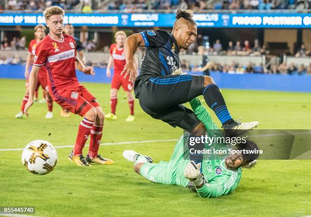 Chicago Fire goalkeeper Richard Sanchez nearly gets stepped on by San Jose Earthquakes forward Quincy Amarikwa during the regular season match...