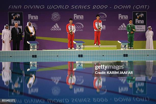 China's Qin Kai , Zhang Xinhua and Mexico's Yahel Castillo stand on the podium after receiving their medals following the men's 3m springboard diving...