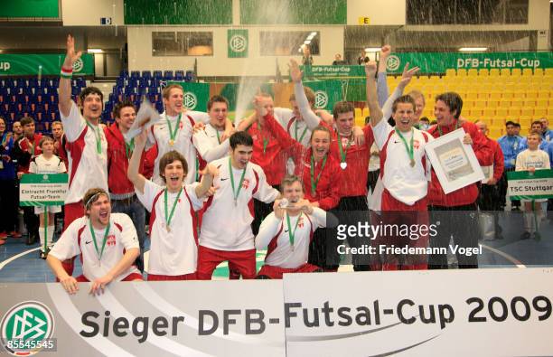 The team of Koeln celebrates after winning the final of the DFB Futsal Cup at the Rhein-Ruhr-Sporthalle on March 23, 2009 in Muelheim, Germany.