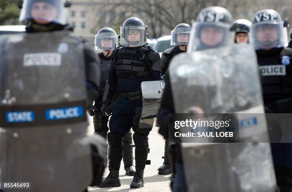 State Trooper Riot Members of the Virginia State Police, dressed in riot gear, stand ...