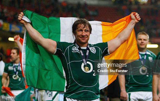 Jerry Flannery of Ireland celebrates winning the Grand Slam after the RBS 6 Nations Championship match between Wales and Ireland at the Millennium...