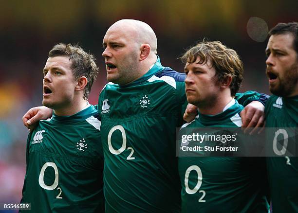Brian O'Driscoll, John Hayes, Jerry Flannery and Marcus Horan of Ireland sing the national anthem during the RBS 6 Nations Championship match between...