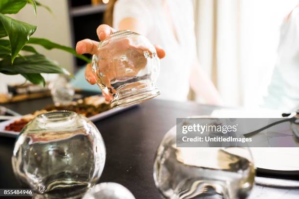 close up cups used in cupping treatment - cupping stock pictures, royalty-free photos & images