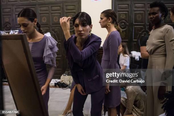 Models pose backstage of the catwalk Code 41 Trending Day on September 29, 2017 in Seville, Spain.