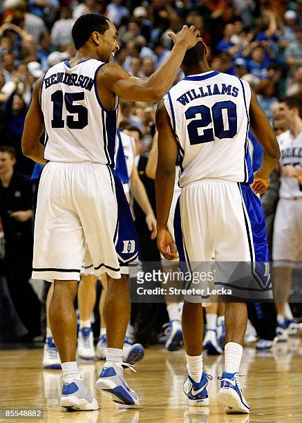 Gerald Henderson of the Duke Blue Devils celebrates with Elliot Williams in the final seconds of their 74-69 loss to the Texas Longhorns during the...