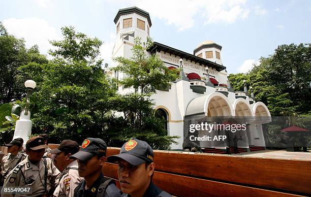 Lifestyle-Indonesia-Buddhism-religion-France,FEATURE by Stephen Coates This picture taken on March 5, 2009 shows Jakarta's Buddha Bar being guarded...