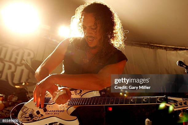 Musician Kirk Hammett of Metallica performs at a secret show celebrating the release of Activision's "Guitar Hero: Metallica" at Stubb's during 2009...