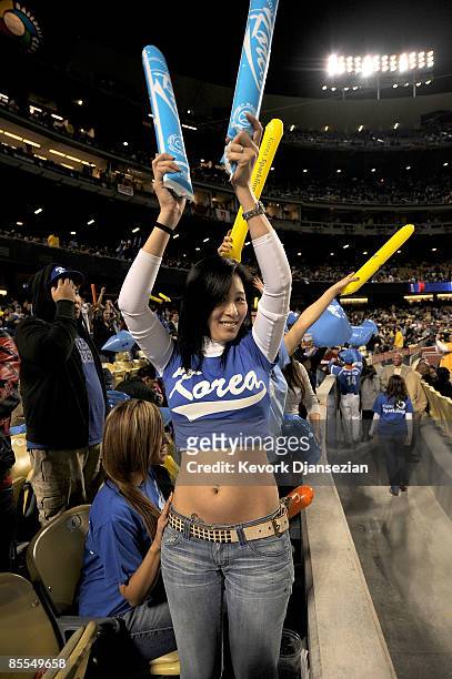 Fans of Korea cheer for the team during the semifinal game of the 2009 World Baseball Classic against Venezuela on March 21, 2009 at Dodger Stadium...