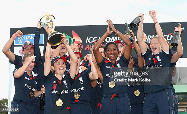 The England team celebrate with the trophy after winning the ICC Women's World Cup 2009 final match against New Zealand at North Sydney Oval on March...