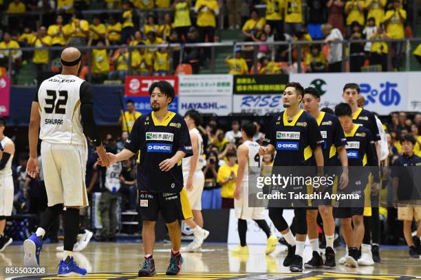 Players shake hands after the B.League game between Tochigi Brex and Seahorses Mikawa at Brex Arena Utsunomiya on September 29, 2017 in Utsunomiya,...