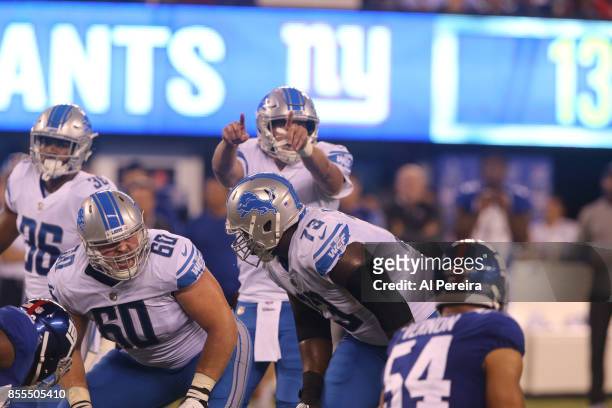 Center Graham Glasgow of the Detroit Lions directs a play against the New York Giants on September 18, 2017 at MetLife Stadium in East Rutherford,...
