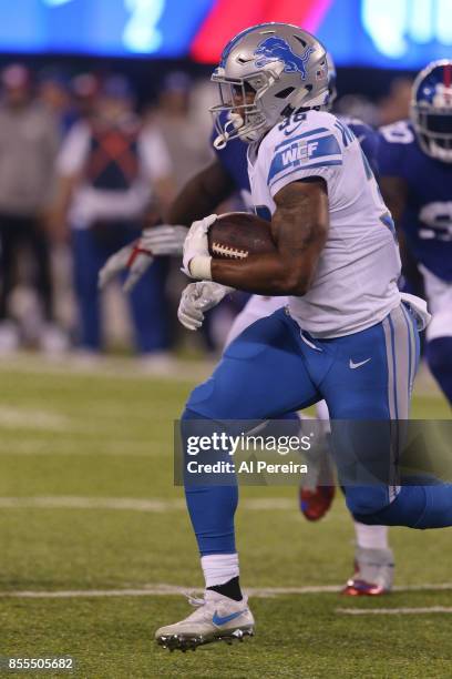 Running Back Dwayne Washington of the Detroit Lions has a long gain against the New York Giants on September 18, 2017 at MetLife Stadium in East...