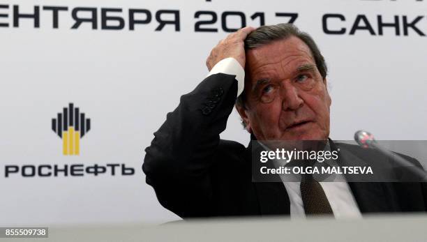 Former German Chancellor Gerhard Schroeder, newly elected chairman of the board of directors of Russia's oil giant Rosneft, attends a briefing in...