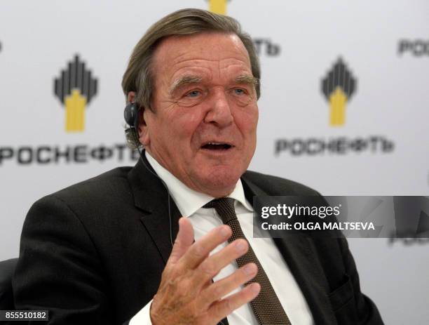 Former German Chancellor Gerhard Schroeder, newly elected chairman of the board of directors of Russia's oil giant Rosneft, speaks at a briefing in...