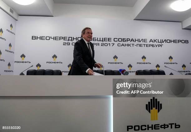 Former German Chancellor Gerhard Schroeder, newly elected chairman of the board of directors of Russia's oil giant Rosneft, arrives for a briefing in...