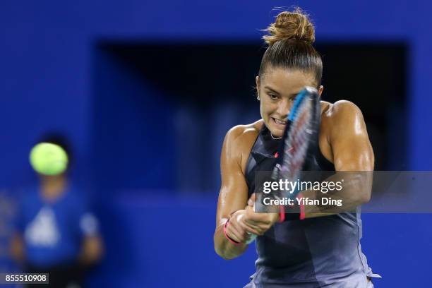 Maria Sakkari of Greece plays a backhand during the Ladies Singles semi final match between Maria Sakkari of Greece and Caroline Garcia of France on...