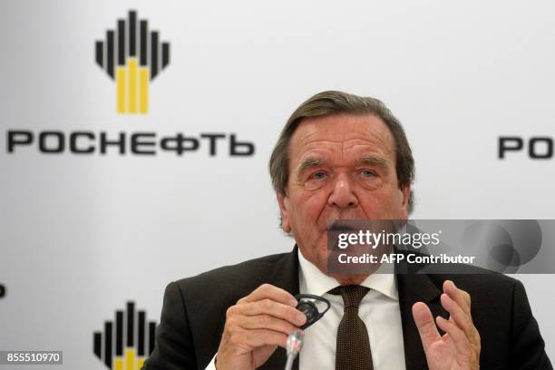 Former German Chancellor Gerhard Schroeder, newly elected chairman of the board of directors of Russia's oil giant Rosneft, speaks at a briefing in...