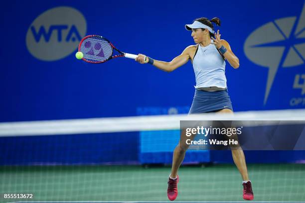 Caroline Garcia of France returns a shot during the match against Maria Sakkari of Greece on Day 6 of 2017 Dongfeng Motor Wuhan Open at Optics Valley...