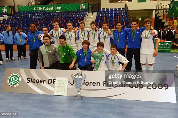 Players of Darmstadt 98 pose after the final of the DFB Futsal Cup at the Rhein-Ruhr-Sporthalle on March 23, 2009 in Muelheim, Germany.