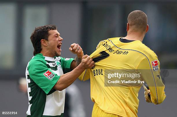 Stephan Schroeck celebrates with his team mate Stephan Loboue of Fuerth after winning 1:0 the second Bundesliga match between Greuther Fuerth and...